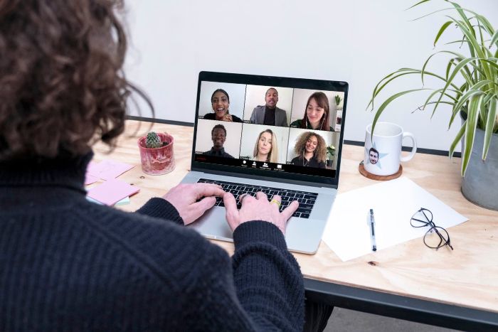 Men on a laptop in a meeting