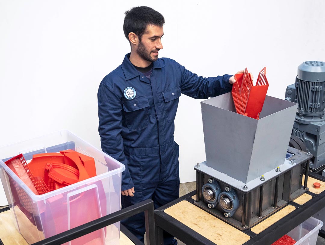 person using a shredder machine