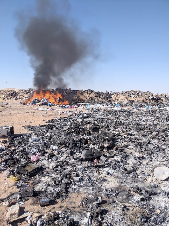 Burning trash in the desert
