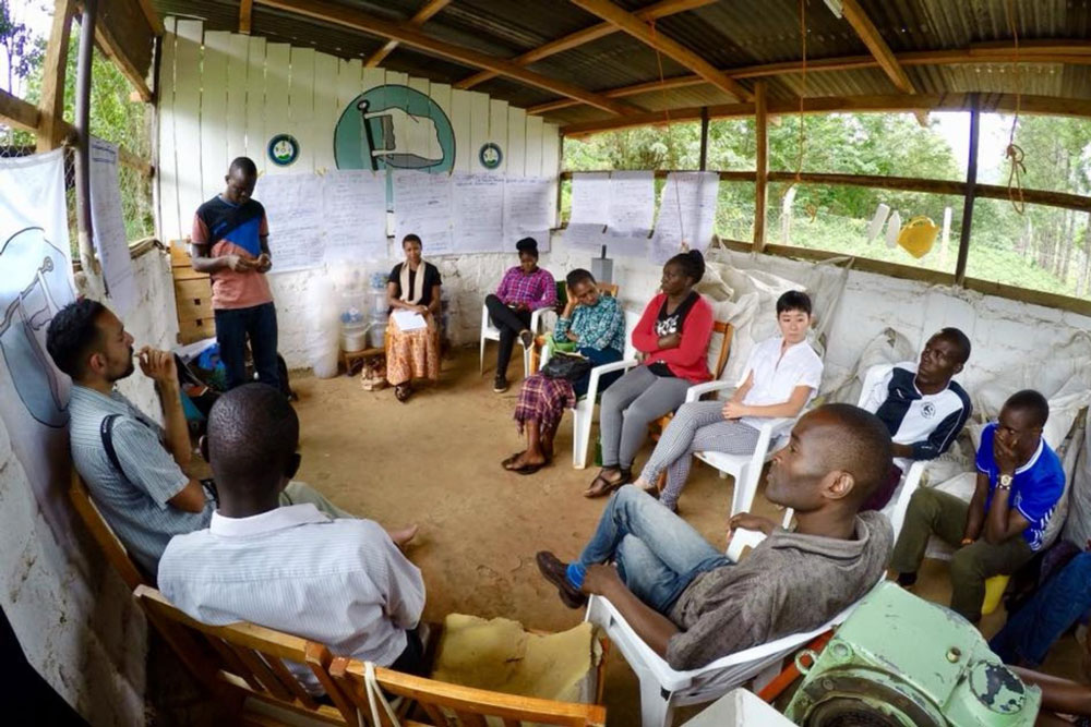 Group of people in a meeting about plastic recycling