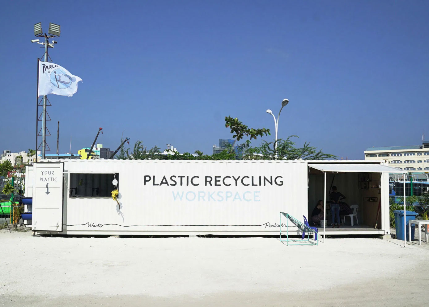 Plastic recycling workshop in a container